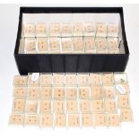 Eighty-one pairs of paste set stud earrings, unmarked; and two odd earrings