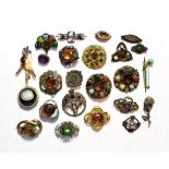 A collection of Scottish hardstone brooches; silver brooches etc