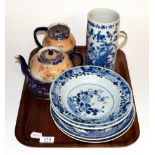 A 19th century Japanese blue and white cylindrical vase; two Chinese export plates; a Pearlware