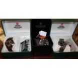 Two Swiss military day/date quartz wristwatches and a Swiss military Hanowa wristwatch, all boxed (