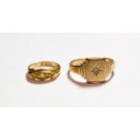 A 9 carat gold diamond set signet ring; and an 18 carat gold diamond five stone ring, finger size