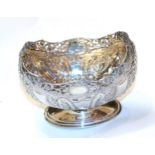 A Victorian silver dish, by Jackson and Fullerton, London, 1900, oval and on spreading foot,