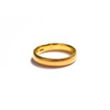 A 22 carat gold band ring, finger size N1/2. Gross weight 5.0 grams.