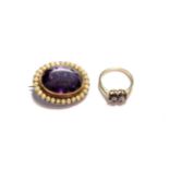 An amethyst and seed pearl brooch, unmarked, length 3.3cm; and a 9 carat gold sapphire and diamond