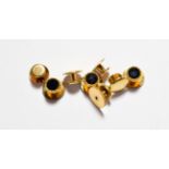 Four 18 carat gold dress studs; and four onyx dress studs, unmarked . Four 18 carat gold dress studs