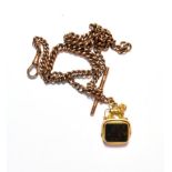 A double Albert 9 carat gold chain, with an attached 9 carat gold lion motif bloodstone swivel fob .