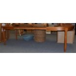 A teak extending D shaped dining table with two additional leaves, 265cm (extended)