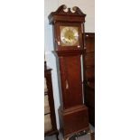 ~ An oak eight day longcase clock, square brass dial bearing a later inscription J.Ramsbottom,
