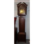 An oak thirty hour longcase clock, brass dial with circular disc signed Wm Gibson B Castle, with