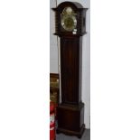 A small chiming longcase clock, early 20th century, chiming on gong rods