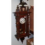 A mahogany Vienna type striking wall clock
