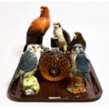 Five Whyte and Mackay bird from decanters by Royal Doulton, a small owl form decanter and a bottle