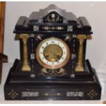 A black slate and marble striking mantel clock, circa 1870