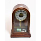 A mahogany cased electric mantel timepiece, the dial signed W Louth, Spalding, bulle patent