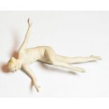 An early 20th century German bisque figure of a nude young dancer, unmarked, modelled in action