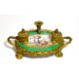 A French Napoleon III porcelain and ormolu desk stand, painted floral vignette within gilt