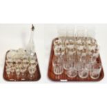 A 19th century cut glass decanter with plated pourer; two cut glass boxes and covers; a set of six