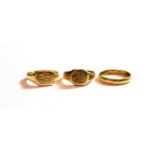 Two 9 carat gold signet rings, finger sizes J and K; and an 18 carat gold band ring, finger size