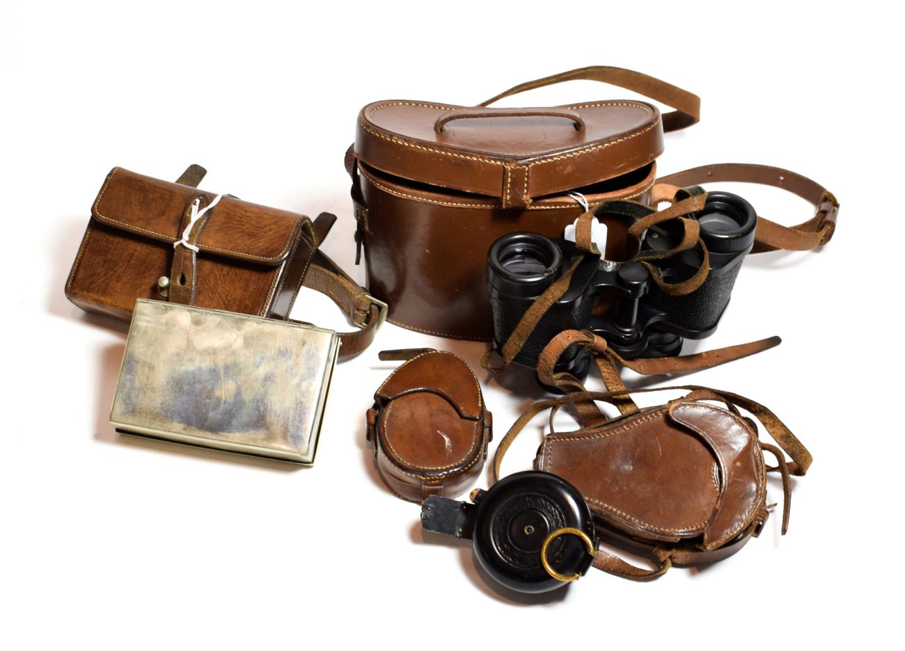 Four leather cased items including two H Hughes and Son's Ltd Military compasses, a cigarette