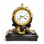 A French gilt metal and bronze striking mantel clock, as an eagle on a black slate base, the
