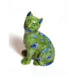 A Mosanic faience pottery cat, circa 1900, modelled seated with blue hearts, on a green ground,