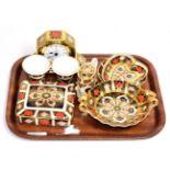 Royal Crown Derby Imari: a mantel clock, pair of vases, box and cover, miniature tea pot and three