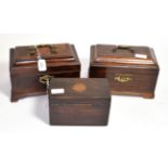 A George III mahogany and crossbanded tea caddy and key; together with two further examples (3)