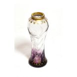 An Art Nouveau Moser glass vase, cut with a lily, clear and amethyst glass with gilt decoration,