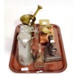 A 19th century German pewter lidded jug and stein; a set of postal scales with weights; a bronze
