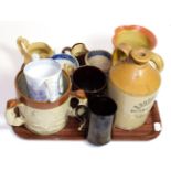 Various 19th century English pottery tankards, jugs and a stoneware tyg, including Doulton,