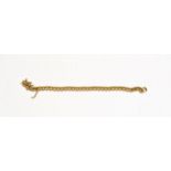 A 9 carat gold curb link bracelet (a.f.), length 19.5cm . Gross weight 20.3 grams