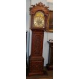 A Victorian carved oak 8 day long case clock, with silvered dial F.K Perkins and Sons, Wakefield