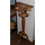 A 19th century gilt wall bracket on later stand, converted to a table