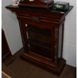 A 19th century carved rosewood pier cabinet, possibly Irish