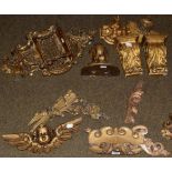 A quantity of gilt wood wall brackets and furniture elements, together with two gilt framed pier