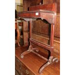 A 19th century mahogany and glazed firescreen with lift action, single drawer, on outswept scroll