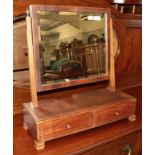 A Victorian pine cradle; and a Victorian mahogany toilet mirror with two drawers (2)