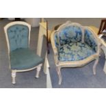 A Victorian cream painted nursing chair, upholstered in button velvet, together with a modern French