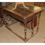 An early 20th century fold over side table