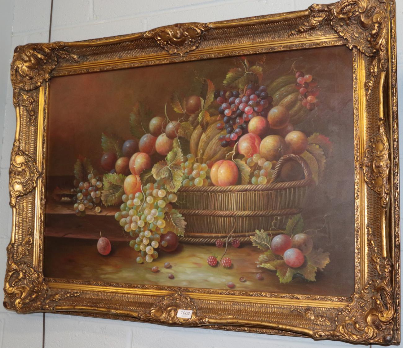 British School, 20th Century, still life of fruits and vine leaves in a basket on a stone ledge, oil