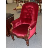 A late Victorian upholstered open armchair