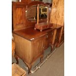 A mahogany mirror back sideboard