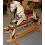 A Tom Cobbley large dapple grey rocking horse