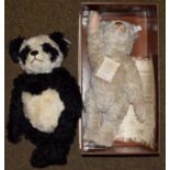 A modern Steiff 1911 replica teddy bear (certificate and boxed); and a black and white panda growler