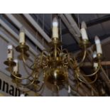 A 20th century Flemish brass chandelier together with another
