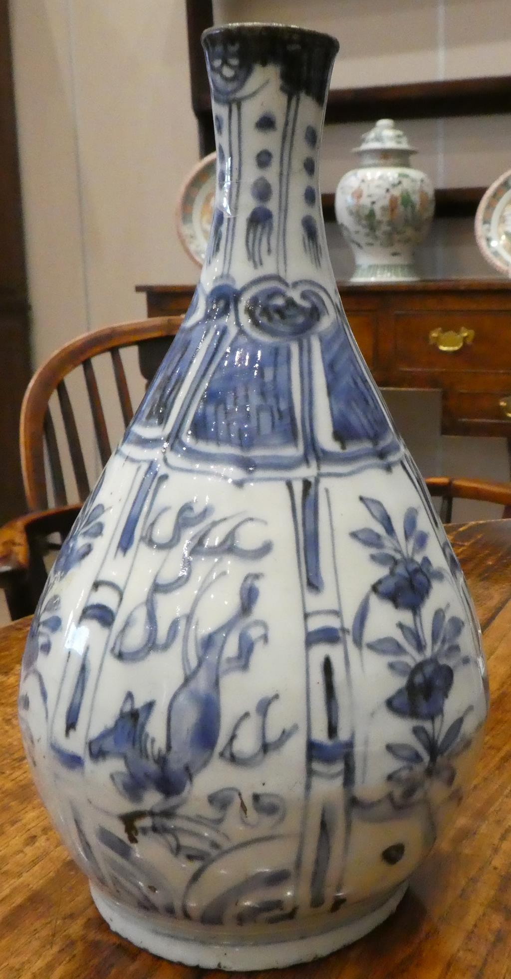 A Chinese Kraak Porcelain Bottle, early 17th century, of pear shape, painted in underglaze blue with - Image 4 of 6
