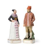 A Pair of Royal Copenhagen Porcelain Figures Representing Regional Costume, circa 1905, modelled