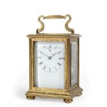 A Brass Engraved Striking Carriage Clock, signed Bolviller A Paris, circa 1840, the elaborately