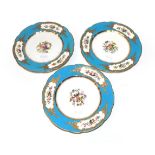 A Set of Three English Porcelain Plates, circa 1870, in Sèvres style, painted with sprays of flowers