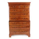 A George III Mahogany, Crossbanded and Ebony Strung Chest on Chest, early 19th century, the bold